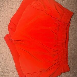 Athleta Bright Orange Athletic Shorts